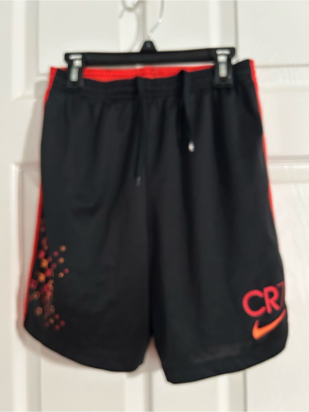 Nike Men’s Black Athletic Shorts with Red Accents